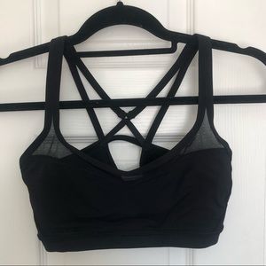 Lululemon black sports bra with mesh and cut-outs